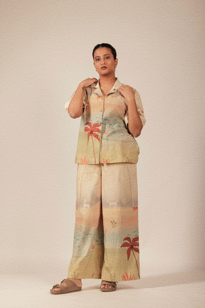 The Safari set is a perfect blend of comfort and effortless style. Crafted from breathable fabric, the set includes a relaxed-fit unisex shirt and wide-leg pants, making it ideal for all-day wear.