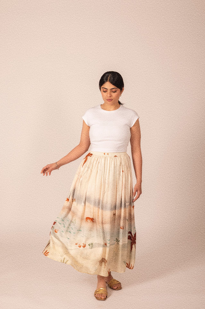 Elevate your style with the Thyme skirt, a gracefully flowing flair fit complemented by a comfortable elasticated waistband.