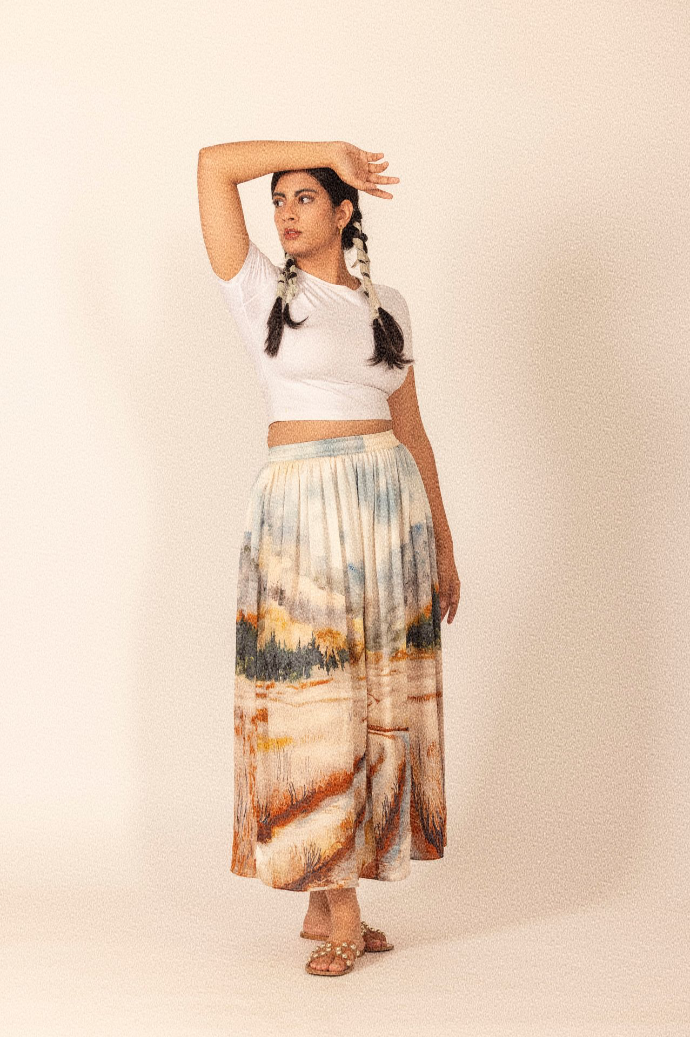 Elevate your style with the Serin skirt, a gracefully flowing flair fit complemented by a comfortable elasticated waistband.